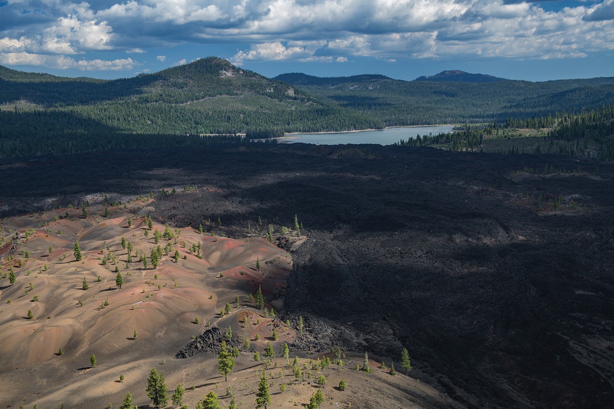 Lava beds abutting Painted Dunes with Snag Laka and Mount Hoffman from Cinder Cone Summit